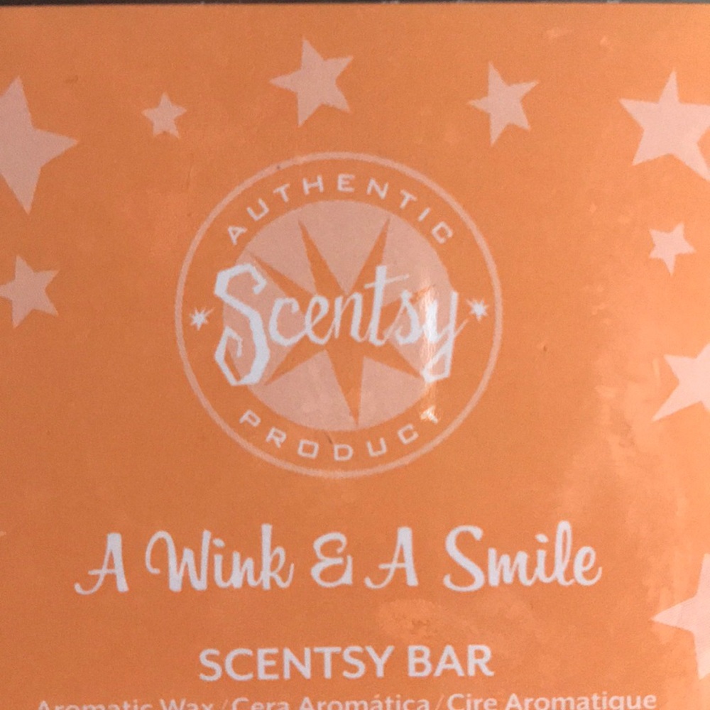 Scentsy wall plug ins (2) and 3 different scents